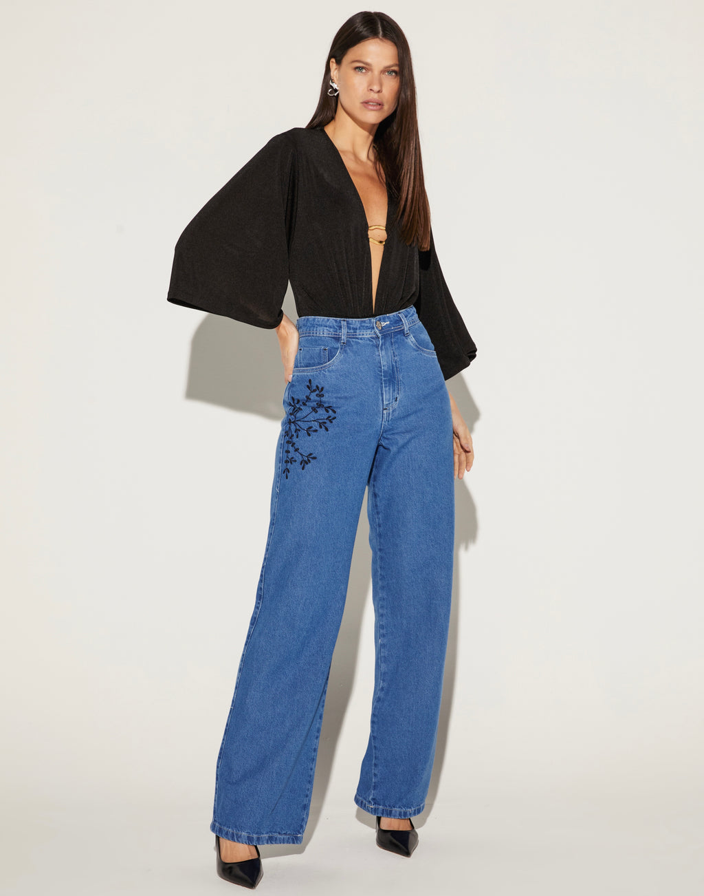 BODY FEMININO DECOTE FUNDO ONÇA PRETA