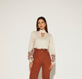 BLUSA FEMININA GOLA ALTA MANGA PUFF ONÇA PRETA