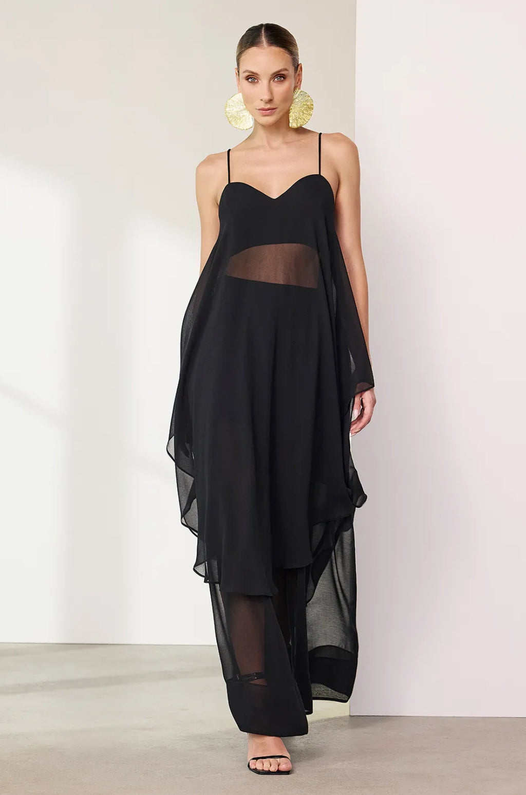 BLUSA ALONGADA LISA COM TRANSPARÊNCIA